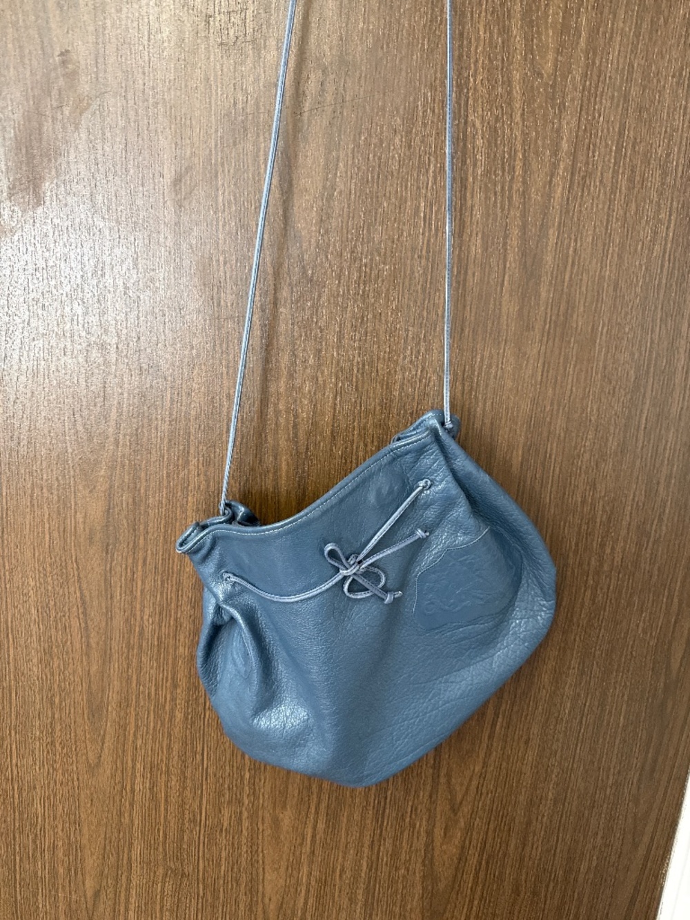 Carlos Falchi Blue leather drawstring Crossbody bag.